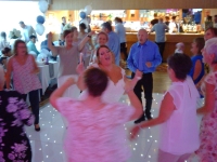 Happy bride with guests